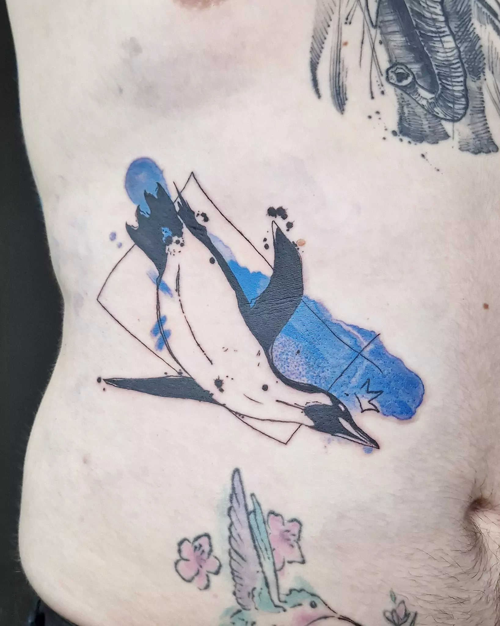 emperor penguin blue abstraction tattoo