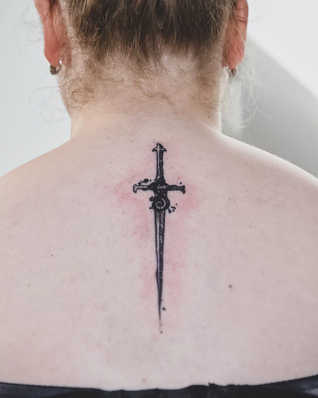 sword tattoo, back tattoo